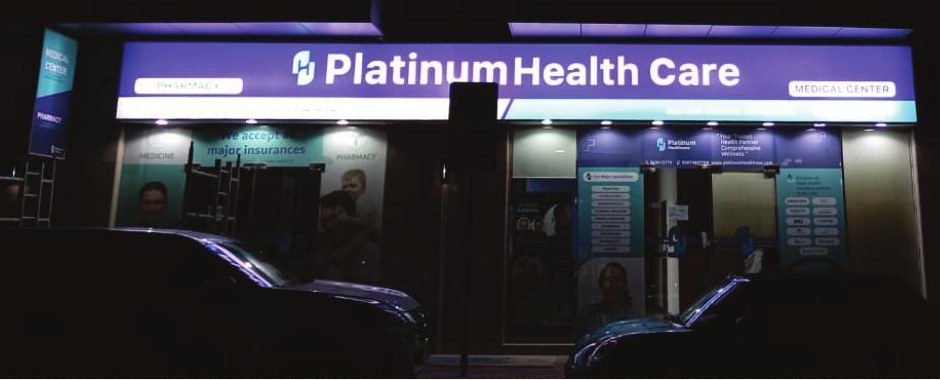 Platinum Healthcare night facade signage